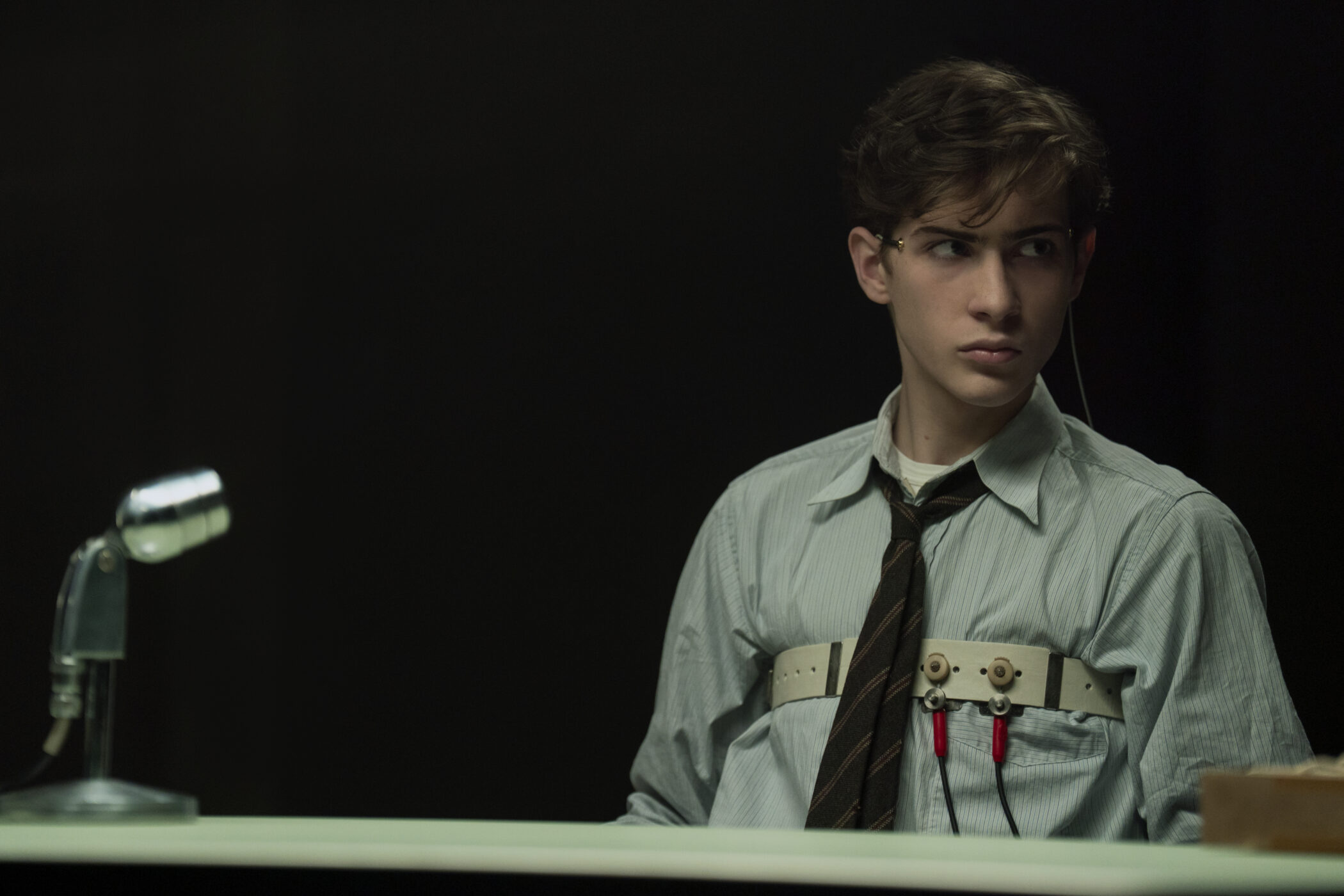 Jacob Tremblay as a teenage Ted Kaczynski wired to a polygraph in Unabomber
