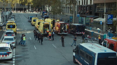 Emergency vehicles and Catalan police units on a Barcelona street in Fernando González Molina's film Cronos