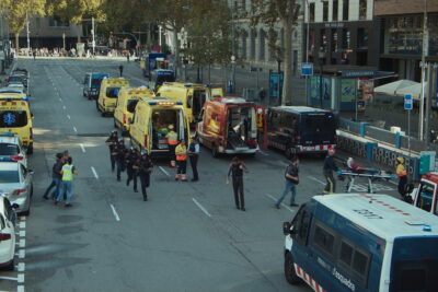 Emergency vehicles and Catalan police units on a Barcelona street in Fernando González Molina's film Cronos