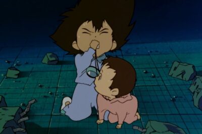 A still from Mamoru Hosoda's 1999 short Digimon Adventure showing a young Taichi crying beside his toddler sister Hikari amid the rubble.