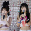 IRENE and Seulgi of Red Velvet at a fansigning event, smiling in coordinated outfits