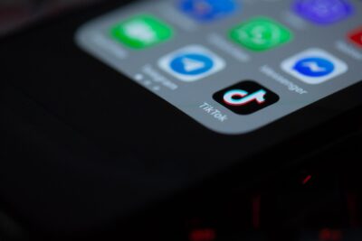 TikTok app icon on a smartphone home screen