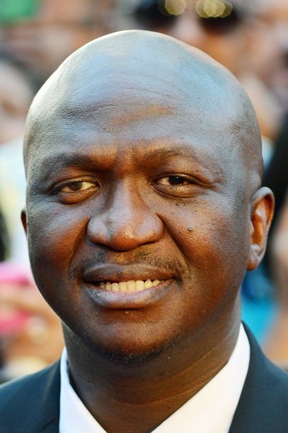 Fana Mokoena como Father Kajama