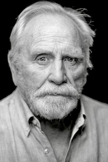 James Cosmo as Mr. Fezziwig (voice)