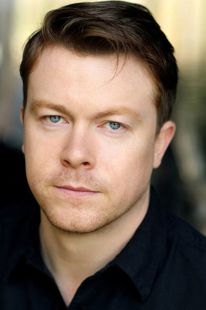 Daniel Rigby as John Wright