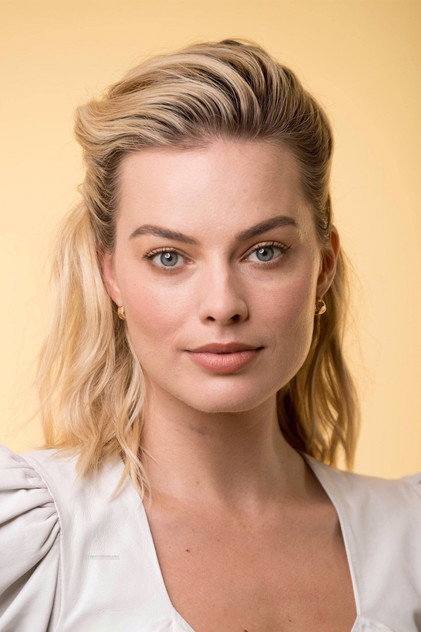 Margot Robbie as Barbie