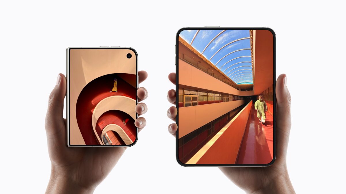 iPhone Duo held folded in one hand and unfolded in two hands, comparing the outer and inner display sizes