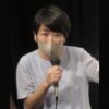 Japanese actress and singer Aki Maeda holding a microphone in 2023