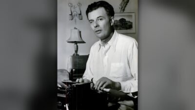 Aldous Huxley at his typewriter, 1947