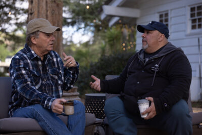 Anson Williams and director Thomas J. Churchill talking on set