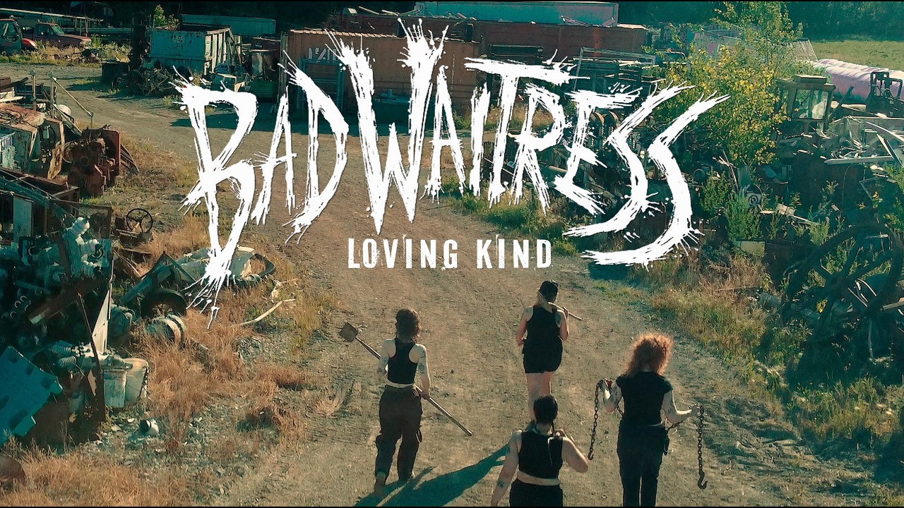 Bad Waitress walking through a scrapyard in the Lovin Kind video