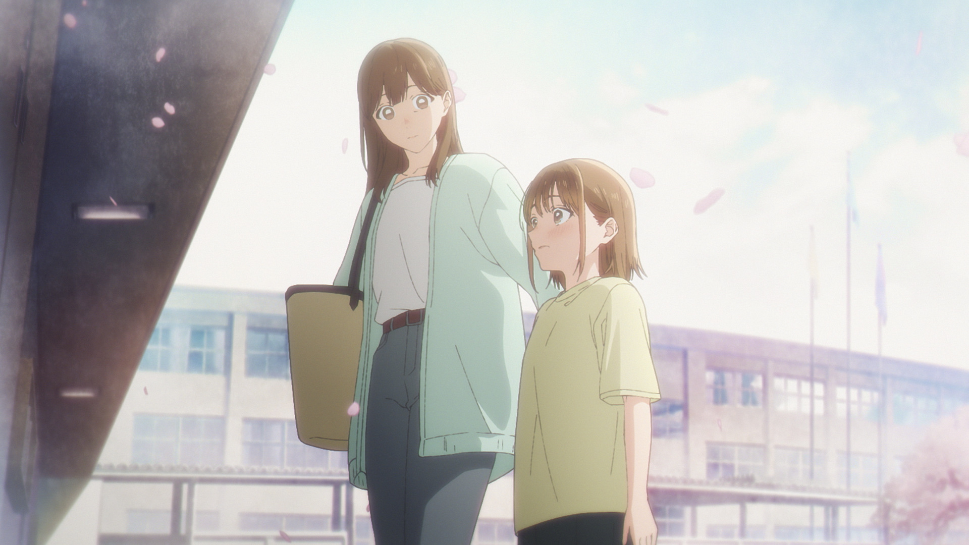 Two girls standing outside the school under falling cherry blossom in Blue Box season 2