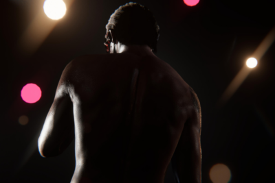 Anton stands in shadow under dramatic stage lights in a tense cinematic moment from BLACKWOOD