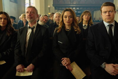 The Wright family in mourning at the patriarch's funeral in I, Jack Wright