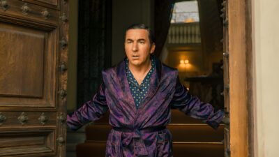 Antonio de la Torre as a down-at-heel marquis in a silk dressing gown in Fading Grandeur (Netflix)