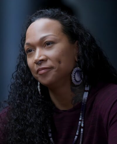 Kali Reis in a 2024 HBO interview for True Detective: Night Country, wearing beaded earrings