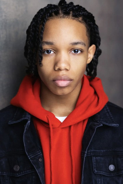 Peyton Jackson como Qwest
