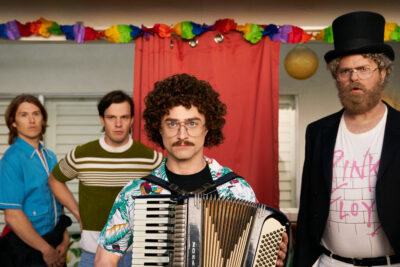 Daniel Radcliffe as Weird Al Yankovic playing accordion in Weird: The Al Yankovic Story