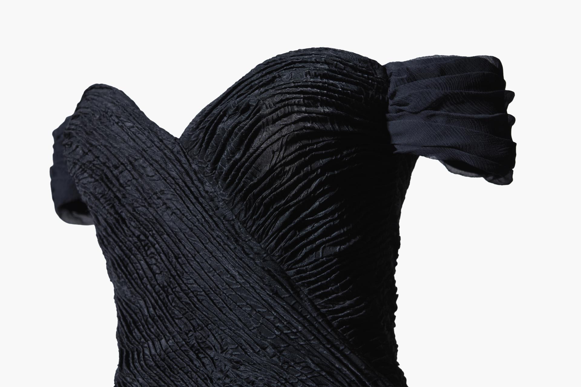 Detail of the pleated silk bodice of Princess Diana's Revenge Dress