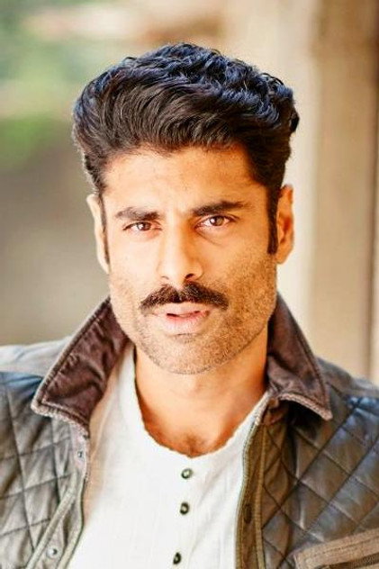 Sikandar Kher as Karthik