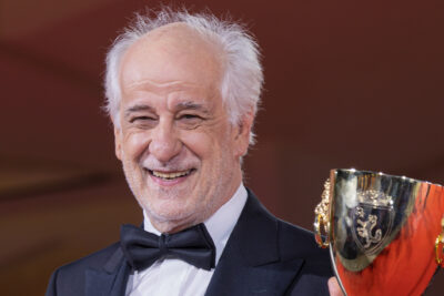 Italian actor Toni Servillo with the Coppa Volpi at the 82nd Venice Film Festival