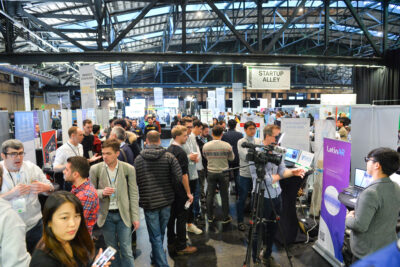 Startup Alley exhibitor tables at TechCrunch Disrupt