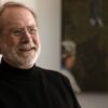 Martin Mull smiling during an interview in the Netflix documentary Who Is Martin Mull?