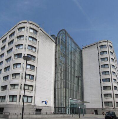 The BT Centre office building in the City of London with the BT logo on its stone facade
