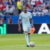Michael Olise in France’s white away kit, number 11, running with the ball during the 2026 World Cup match against Morocco