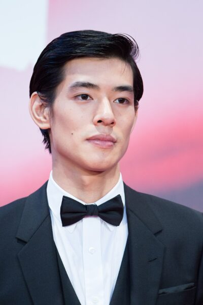 Ayumu Nakajima in a black tuxedo and bow tie on the red carpet at the opening ceremony of the Tokyo International Film Festival, October 2017