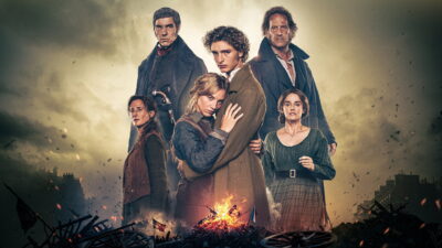 Key art for Fred Cavayé’s Les Misérables with Vincent Lindon, Tahar Rahim, Noémie Merlant and Camille Cottin over a burning Paris barricade