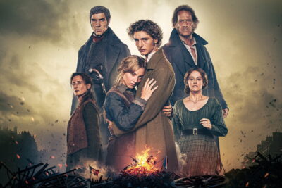 Key art for Fred Cavayé’s Les Misérables with Vincent Lindon, Tahar Rahim, Noémie Merlant and Camille Cottin over a burning Paris barricade