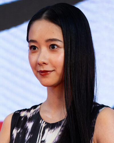 Mayu Hotta with long straight black hair and red lipstick on the red carpet of the Tokyo International Film Festival opening ceremony, 2019
