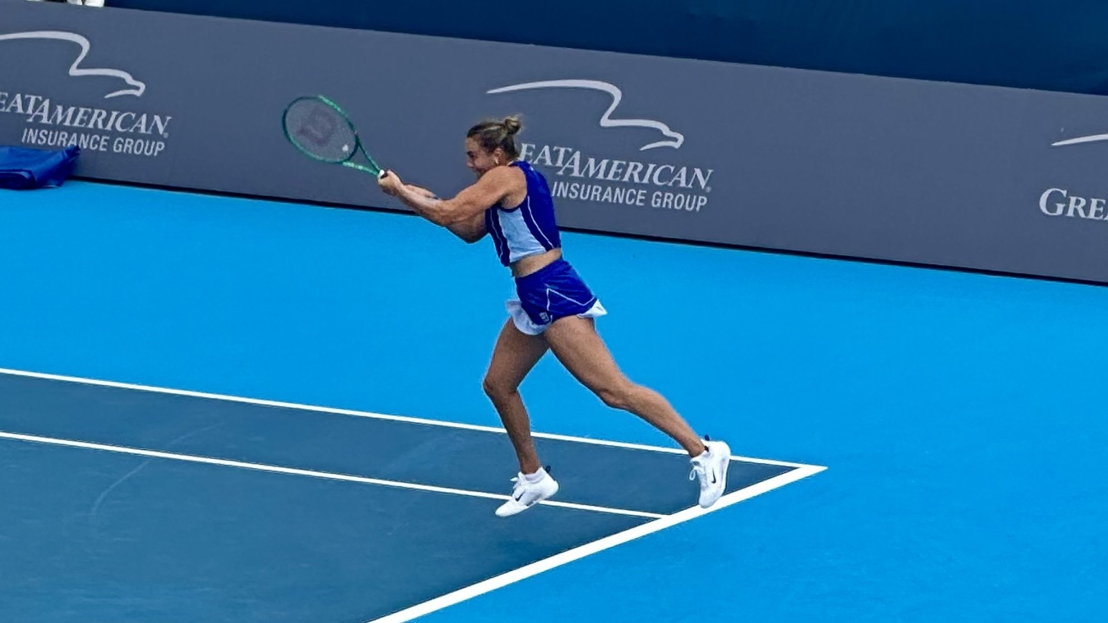 Aryna Sabalenka hitting a forehand on a hard court in 2026