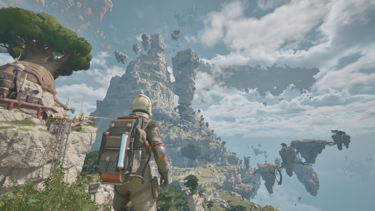 A suited explorer looks out from a cliff at the floating islands of planet Tycos in ATMOSFAR