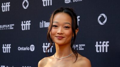 Callina Liang smiling on the red carpet of the 2024 Toronto International Film Festival