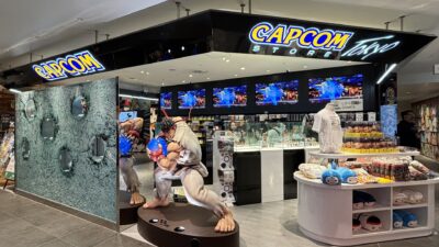 Capcom Store Tokyo at Shibuya Parco, with the Capcom logo and a Street Fighter Ryu statue