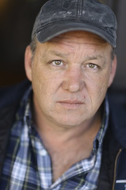 Dane Rhodes als Polizeichef Collins
