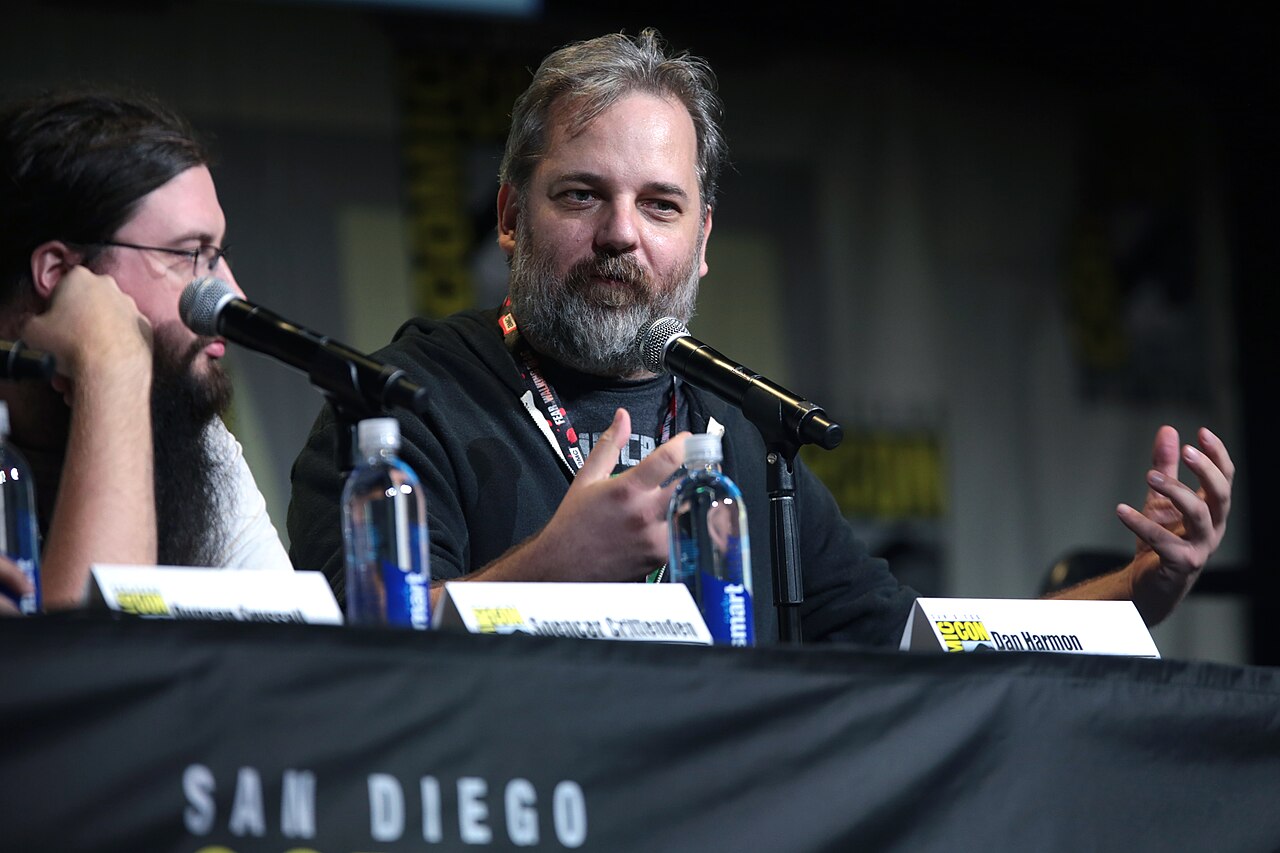 Dan Harmon speaking into a microphone at the Rick and Morty panel at San Diego Comic-Con 2016