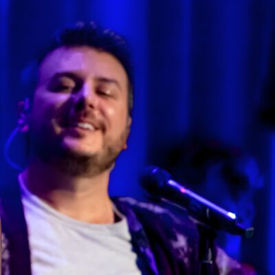 Dan Nigro playing guitar on stage at the Theatre at Ace Hotel in Los Angeles, October 2023