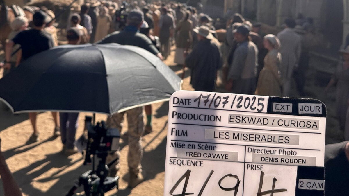 Clapperboard on the first day of shooting Fred Cavayé’s Les Misérables, with extras in period costume