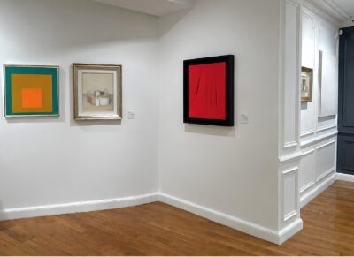 A Morandi still life hung between an Albers Homage to the Square and a red Fontana cut canvas