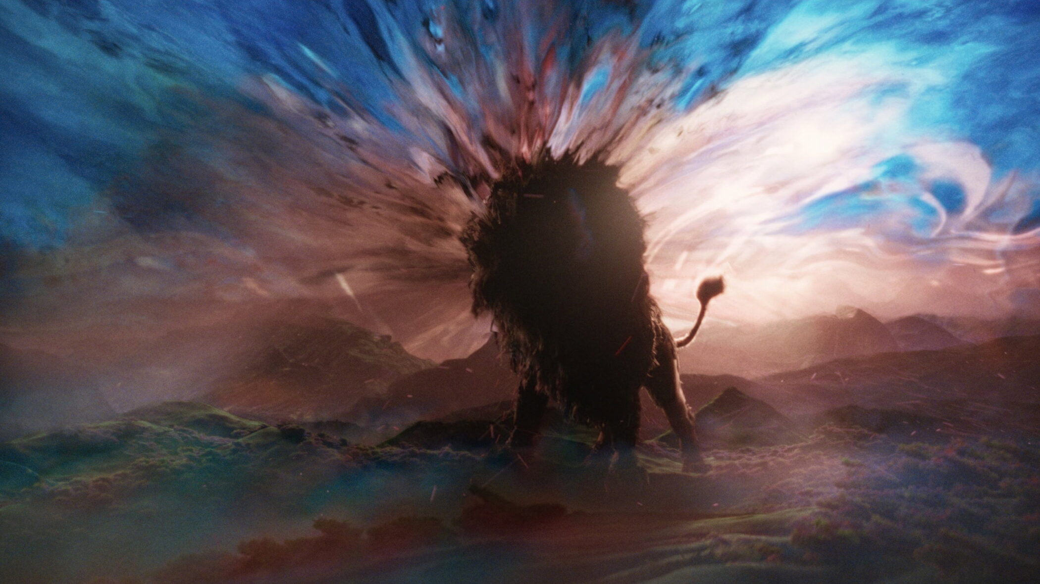 Aslan the lion against a burst of light in Greta Gerwig’s Narnia: The Magician’s Nephew