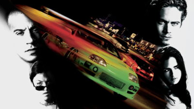 Vin Diesel, Paul Walker, Michelle Rodriguez and Jordana Brewster in key art for The Fast and the Furious