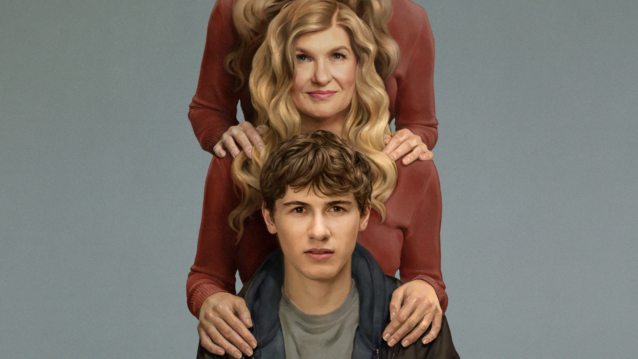 Phony key art with Connie Britton standing behind Sam Nivola, two pairs of hands resting on his shoulders against a grey backdrop