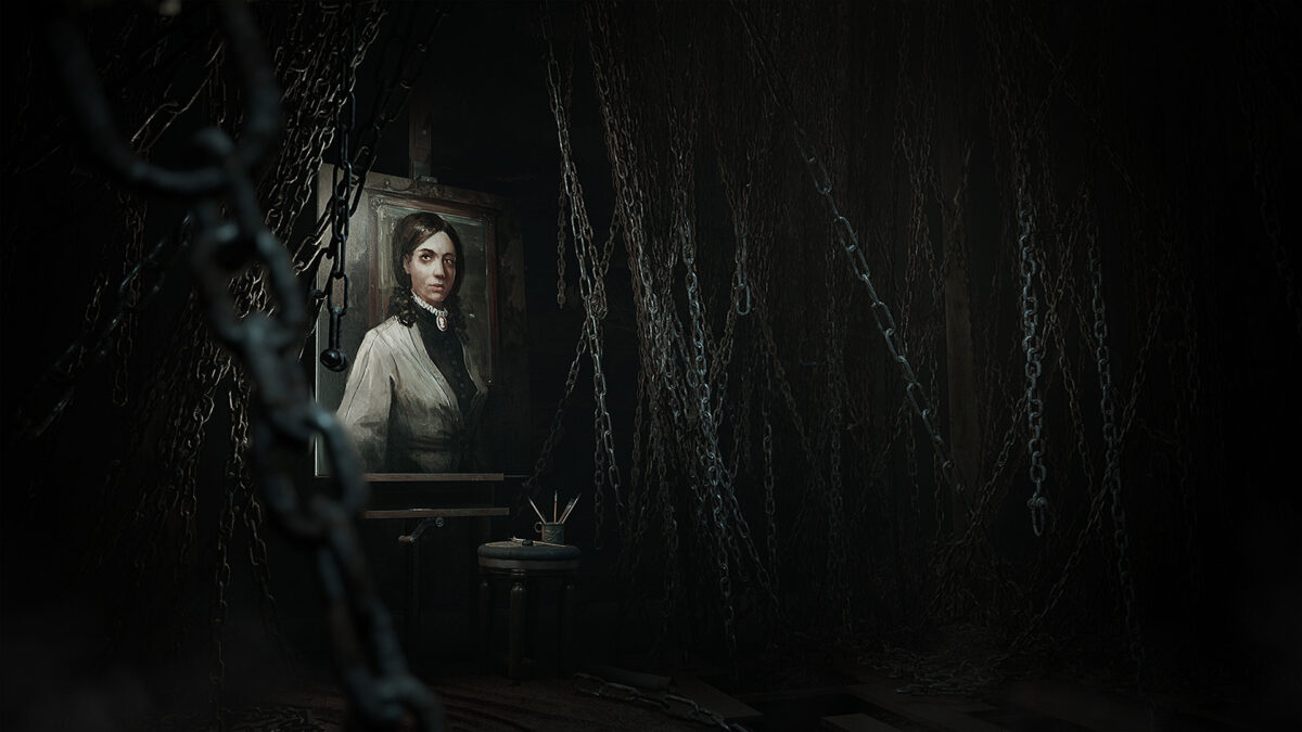 A portrait of a woman on an easel surrounded by hanging chains in a dark studio in Layers of Fear
