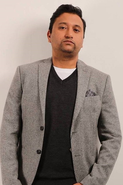 Gopal Datt como o pai de Jain