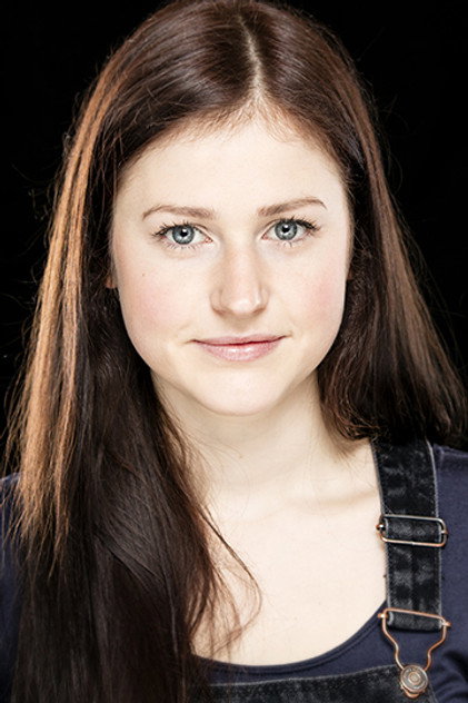Ria Zmitrowicz como Roxy Monke