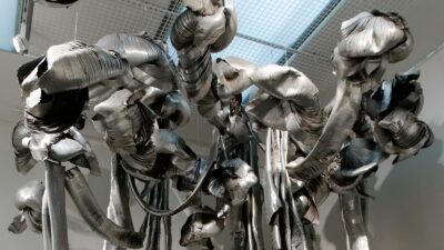 Marisa Merz's 1966 Living Sculpture, coils of cut and stapled aluminium sheet hanging from the ceiling at Tate Modern