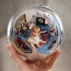 Love Triangle cover art showing Angèle reflected inside a glass sphere held in a hand